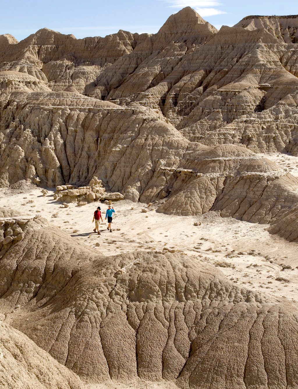 People hiking through Toadstool Geologic Park